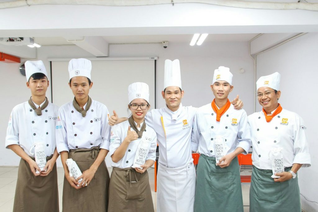photography of group people inside room