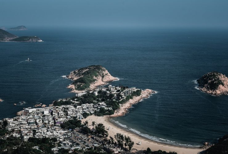 aerial view of green and brown island during daytime