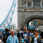 people walking on bridge