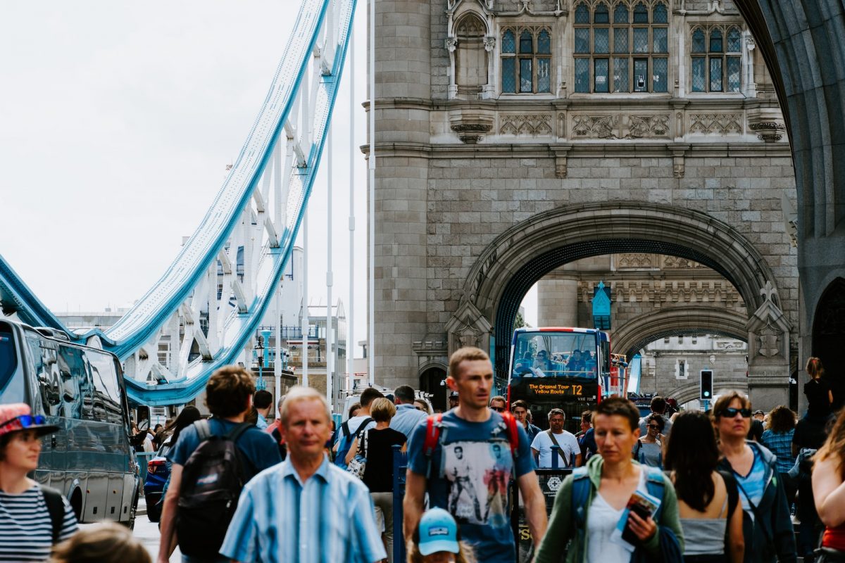 people walking on bridge