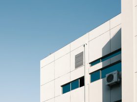 white concrete building under blue sky during daytime