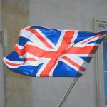 raised United Kingdom flag