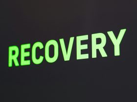 a close up of a sign that reads recovery