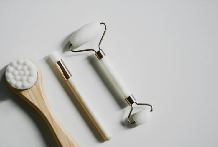 silver spoon and fork on white surface