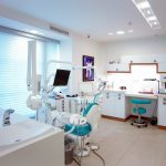 modern dental office with chair and equipment