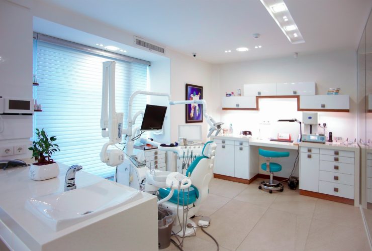 modern dental office with chair and equipment