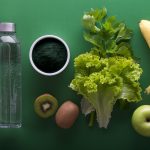 assorted fruits and vegetables on green surface